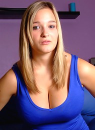 Slimand Stacked 18 year old H cup Holly shows off her massive boobs